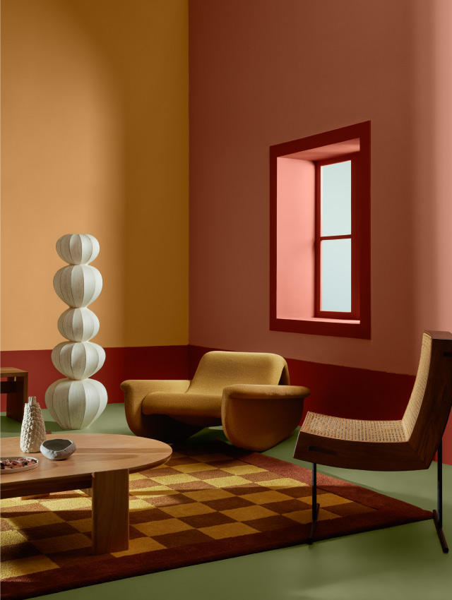 Imagem de uma sala amarela e rosa